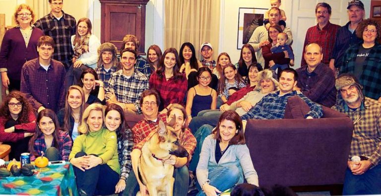 Group of people with their dog.