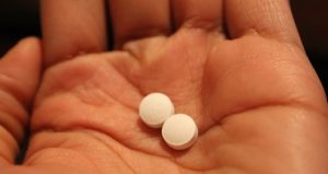 Woman Holding The Abortion Pill